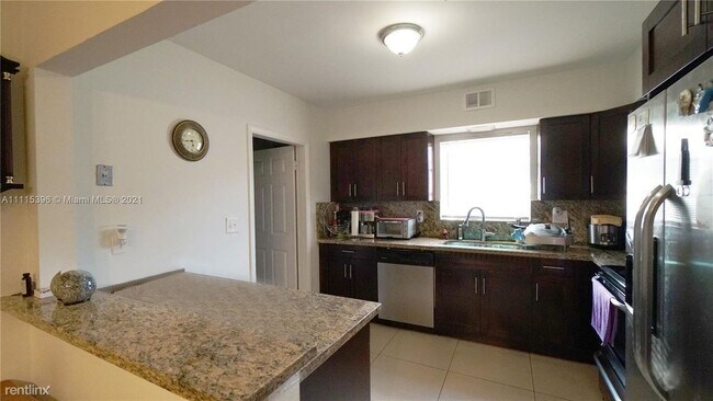 Building Photo - 3 br, 2 bath House - 6740 SW 12th St