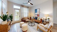 Located at 104 Herrings Green Loop in Mooresville, NC, this single-floor, 2-bedroom, 2-bathroom residence offers a thoughtfully designed layout with modern finishes throughout. The open-concept kitchen is a standout feature, boasting white shaker cabinetry, stainless steel appliances, a subway tile backsplash, light wood-look flooring, and a central island with pendant lighting and bar seating — ideal for both cooking and casual dining. The living room is bright and inviting, featuring large windows with outdoor balcony access, a ceiling fan, and generous natural light. The primary bedroom offers a comfortable, well-sized retreat with plush carpet, a ceiling fan, natural light from large windows, and access to an en-suite bathroom. The primary bathroom includes a single-sink vanity with white cabinetry, black hardware accents, patterned tile flooring, and a walk-in closet. The second bedroom is versatile and well-lit, with carpet flooring and ample natural light. The second bathroom features wood-look flooring, a tub-shower combination with white subway tile surround, and a classic vanity. A dedicated closet adds practical storage. The overall ambiance is clean, modern, and cohesive throughout.