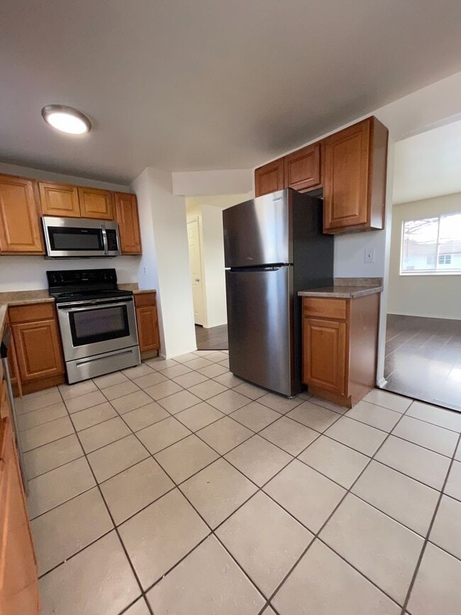 Building Photo - West Jordan Four Bedroom; Garage; New Kitchen Cabinets; Fenced Yard; Central Air