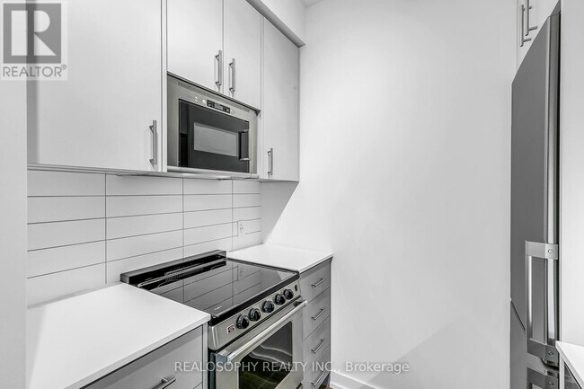 Photo du bâtiment - 115 Larchmount Ave