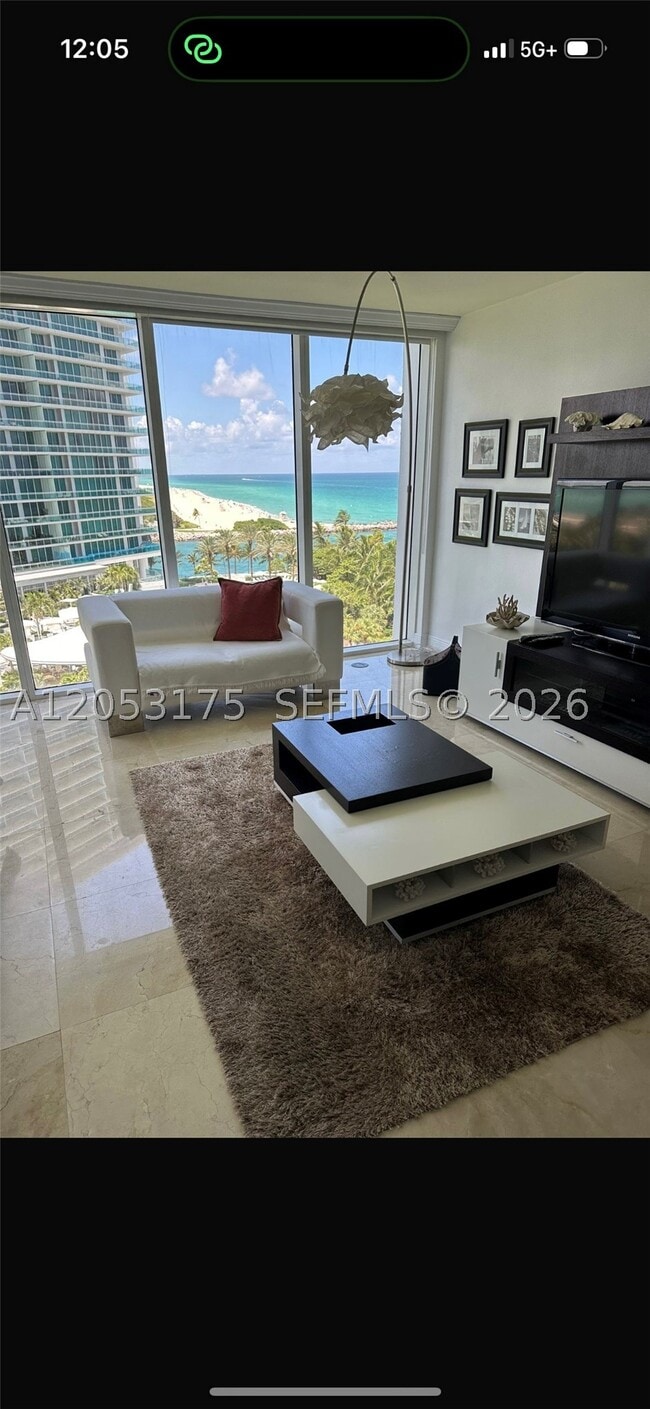 Building Photo - 10275 Collins Ave