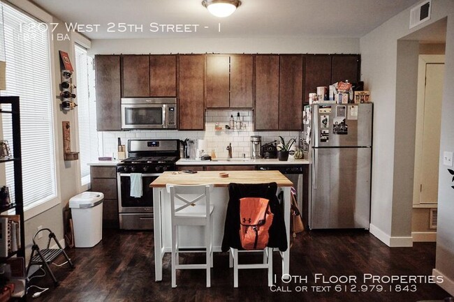 Building Photo - One Bedroom with Washer and Dryer in Unit!