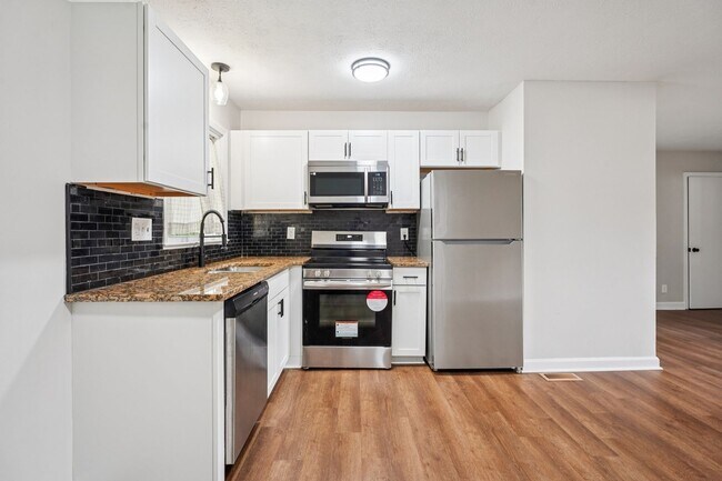 Building Photo - 4BR Brick Ranch with Upgrades & Room to Feel at Home!