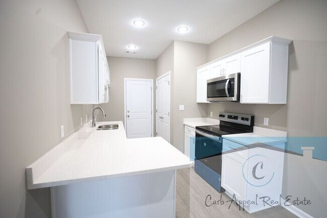 Building Photo - Luxury 2 bed 1 bath apartment - brand new construction!! Washer, dryer and utilities included!!