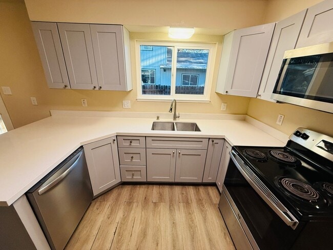 Foto del edificio - 3 bed 2 bath unit with 1 car garage - Pet Friendly