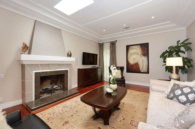 Building Photo - Welcome to this beautifully updated Spanis...