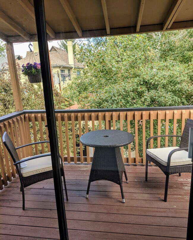 Balcony overlooking the lush backyard. - 1044 N Clarkson St