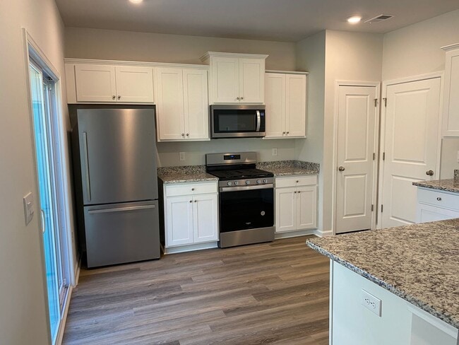 Building Photo - Brand New Upscale, 3 Bedroom House, Locate...