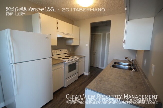 Photo du bâtiment - ? Beautifully Renovated 2-Bedroom Suite in Taber Manor!
