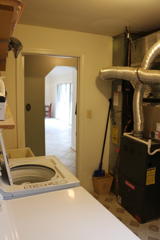 Utility/laundry room. Dual zoned heating and A/C on 2 floors! - 11915 Harmony Lane