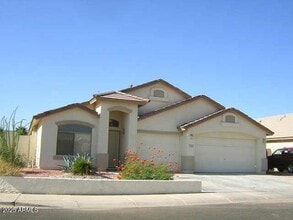 Building Photo - 11219 W Vernon Ave