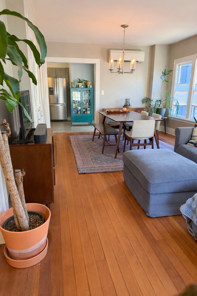 Light-filled living & dining space made for cozy nights and lovely dinners. Furniture not included. - 604 NE Shaver St