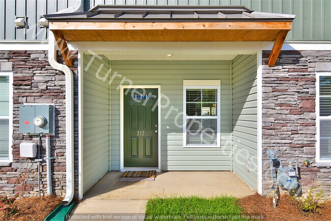 Building Photo - Awesome 2 BR Townhome w/ Granite Throughout