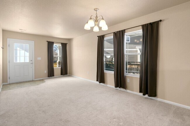 Building Photo - Backs to open space!