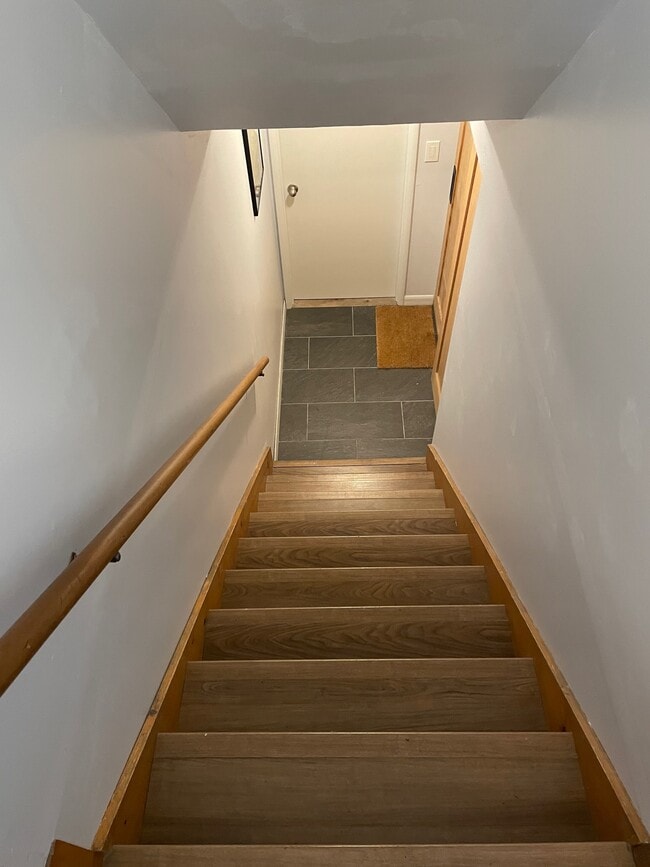 Stairs leading down to in-law unit - 5520 N Concord Ave
