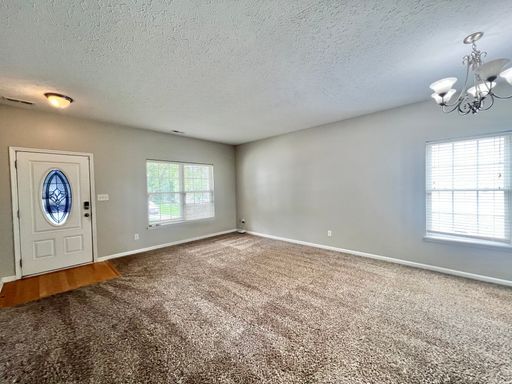 Foto del edificio - Charming 4BD, 2.5BA Durham Home with a Bonus Sun-Room & Fenced In Yard Only 10 Minutes Away from ...