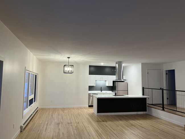 Unit B Living Dining and Kitchen - 207 6th St