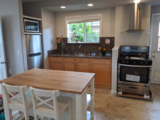Fully stocked kitchen with most everything you need to make yourself at home. - 4848 Diane Ave