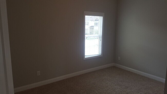 Building Photo - Georgous Full brick townhome in Coveted co...