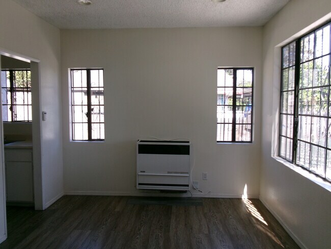 Building Photo - 1209 W 60th Pl