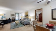 Located at 304 W North St in Waukesha, Wisconsin, this well-appointed 2-bedroom, 1-bathroom residence offers a comfortable and functional single-floor layout. The combined living and dining area forms the heart of the home, featuring plush carpeting, a ceiling fan, and a sliding glass door that fills the space with natural light and provides access to an outdoor patio. The open layout allows the living and dining areas to flow seamlessly together, creating an inviting atmosphere ideal for both relaxing and entertaining.

The kitchen features warm oak cabinetry, durable countertops, hardwood-style flooring, and a stainless steel range. A dedicated laundry area is conveniently tucked within the kitchen space.

The generously sized primary bedroom offers direct patio access through a sliding glass door, a ceiling fan, and plush carpet, creating a bright and restful retreat. The second bedroom is equally comfortable, also featuring a ceiling fan and soft carpet flooring.

The bathroom is well-equipped with oak vanity cabinetry, a wide mirror with lighted surround, hardwood-style flooring, and a separate water closet for added privacy. Throughout the home, four closets provide abundant storage. The overall ambiance is clean, bright, and move-in ready.