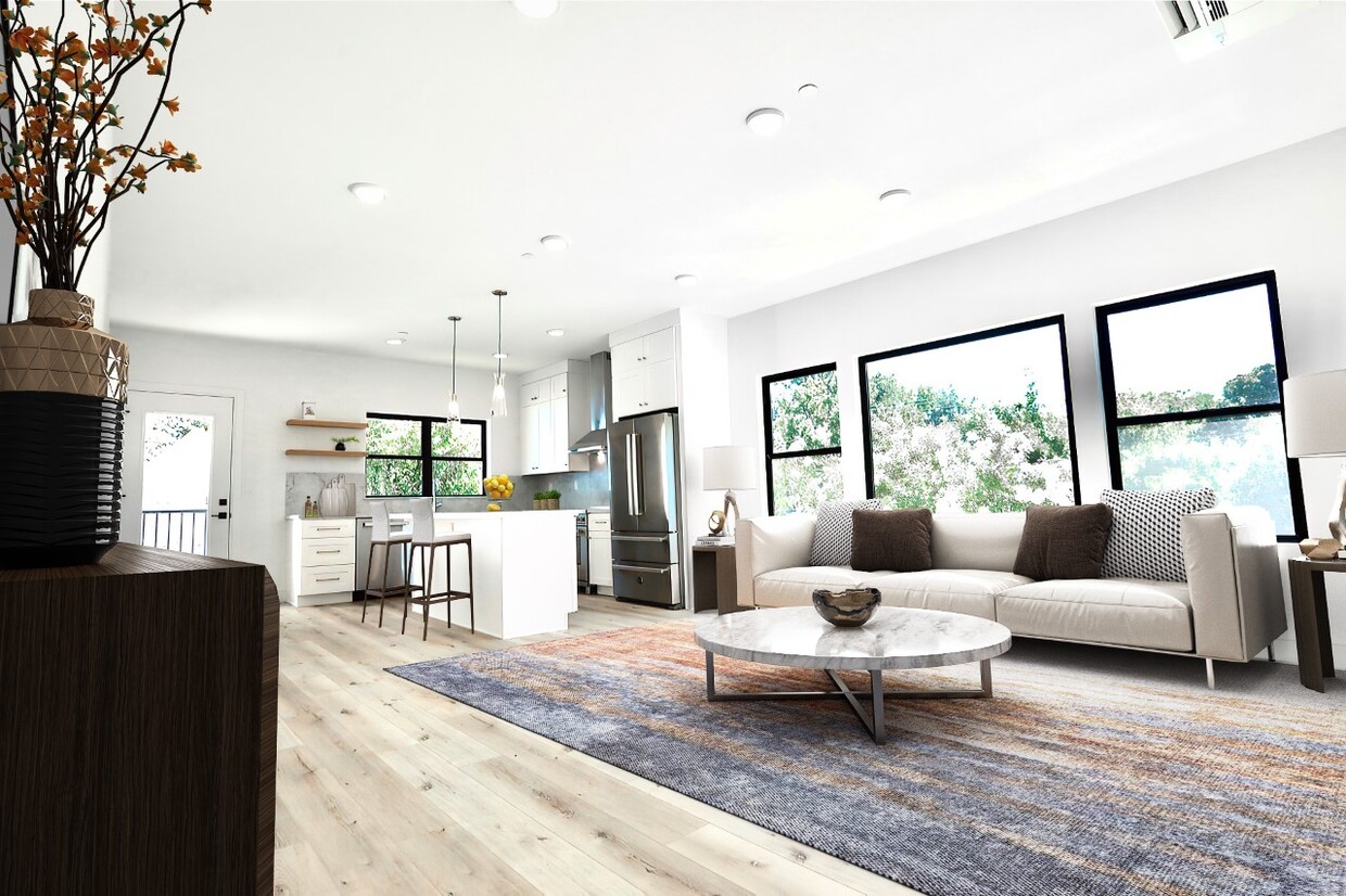 Open Kitchen + Living Room with Balcony Access - 1323 Democracy Aly