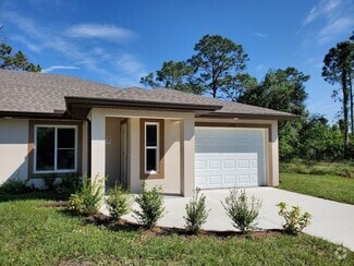 Building Photo - 3x2 Duplex Unit