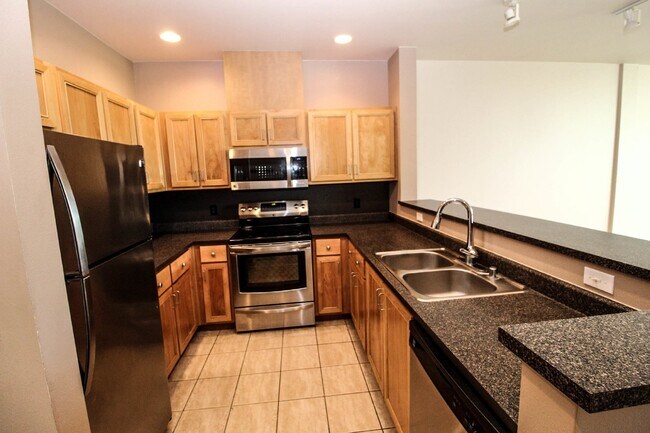 Building Photo - Downtown Redmond.  Secured Garage parking ...