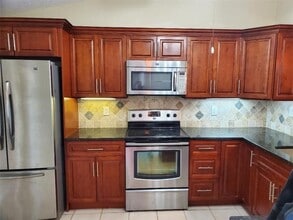 Building Photo - 3853 Carambola Cir N