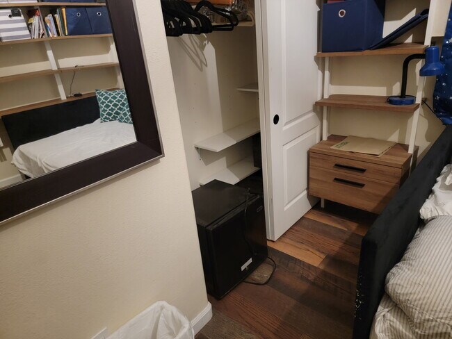 Closet w/ built in shelves for shoes, etc., nightstand w/ open shelves - 1608 Paraiso Dr