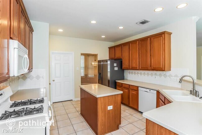 Foto del edificio - 5 br, 3.5 bath House - 12003 Sundance Cour...