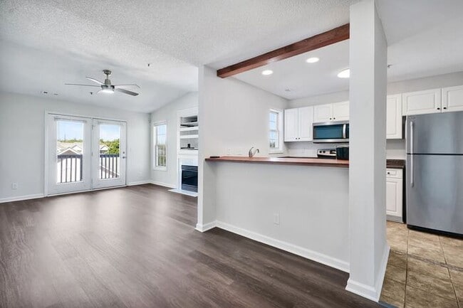 Building Photo - Freshly Painted! New Luxury Vinyl Plank Floors! Updated Lighting! Pool View Unit! Cape Cottages C...