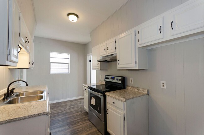 Building Photo - NICE 1 bedroom 1 bath duplex! Will not las...