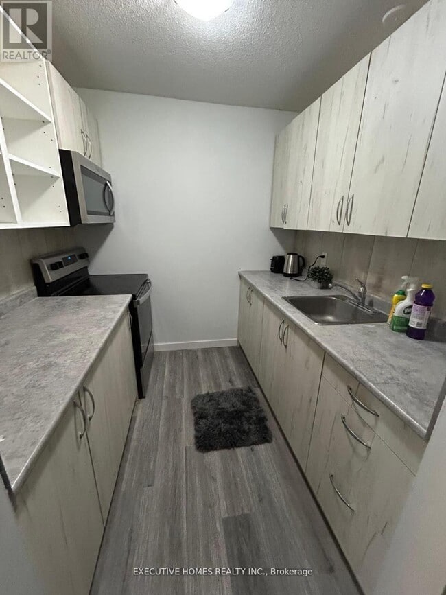 Photo du bâtiment - 303 King St N