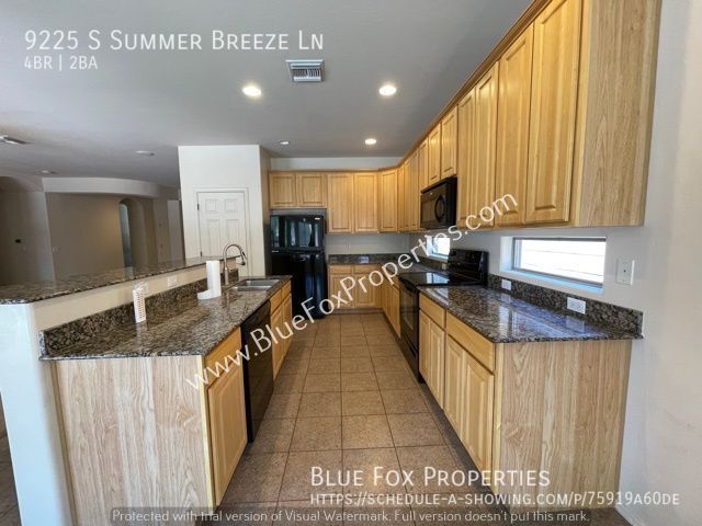 Foto del edificio - 9225 S Summer Breeze Ln