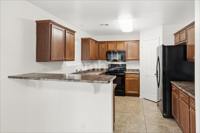 Building Photo - 7340 W Alicia Dr