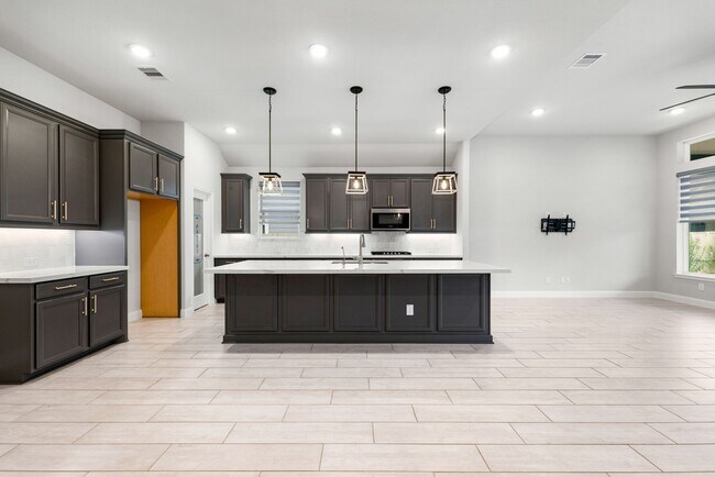 Foto del edificio - 6442 Pomegranate Blossom Dr