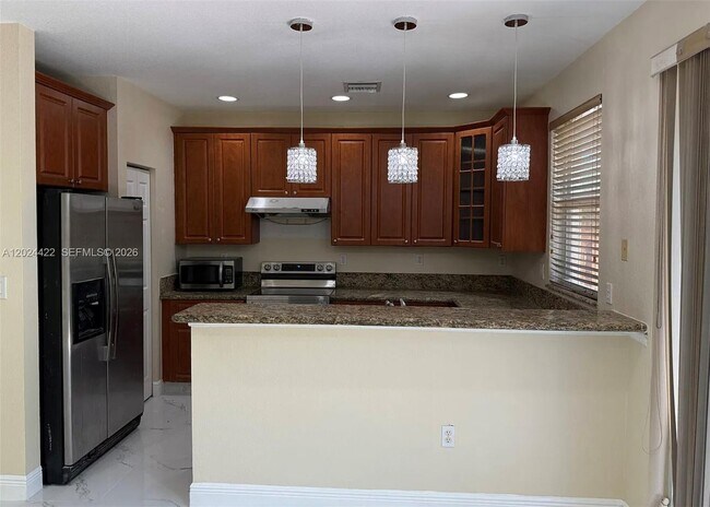 Foto del edificio - 6542 Hidden Cove Dr