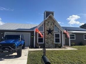 Building Photo - 1297 SE Floresta Dr