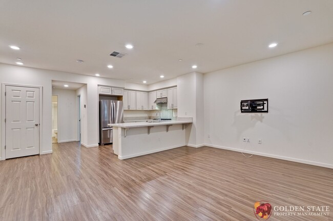 Building Photo - Modern 2-Bed Condo with Tesla Charger & At...