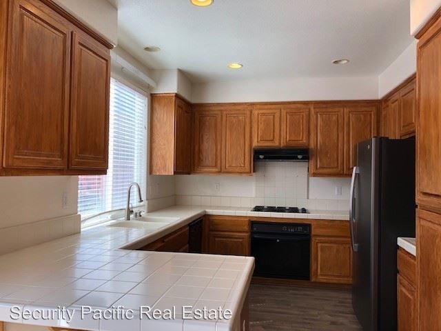 Building Photo - 4 br, 2.5 bath House - 6235 Baywood Dr.