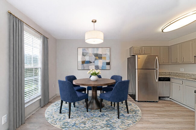 Dining area with hardwood-style flooring - Kensington Columbia
