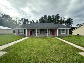 Building Photo - 6119B Vinnie Dr