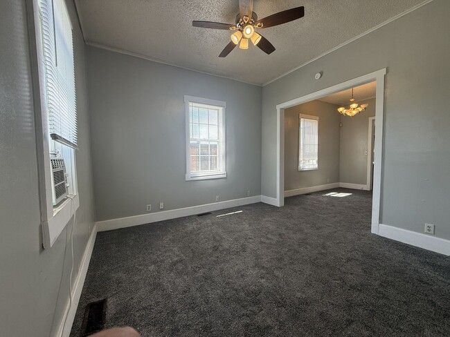 Building Photo - 2 Bed House w/ Ramp Access and Fenced in Back Yard + Walk In Shower