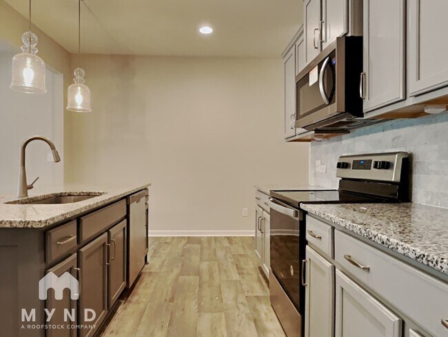 Foto del edificio - 8645 River Ridge Dr