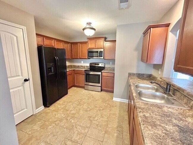 Building Photo - Make The Move To Olive Branch For Better S...