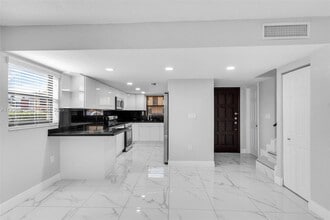 Building Photo - 5061 W 12th Ln