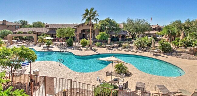 The property boasts a large, naturally designed resort pool. - 11500 E Cochise Dr