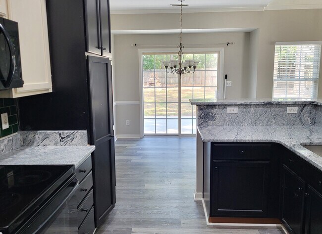 Foto del edificio - 8300 Neuse Hunter Dr