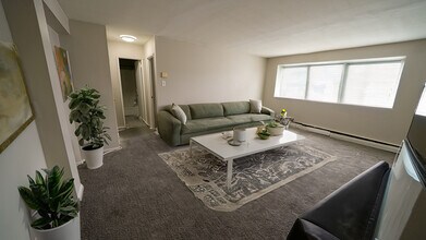 Living room in a 1 bedroom apartment - Brynfield Court Apartments